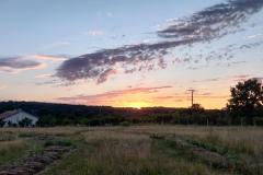 Le coucher de soleil sur le plateau du jardin